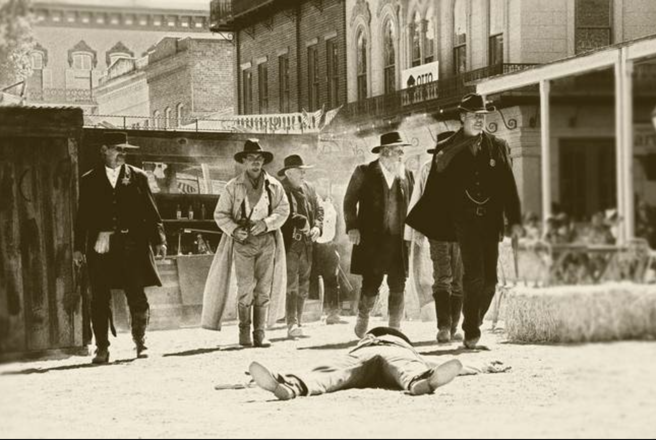 Dead cowboy with men with guns western